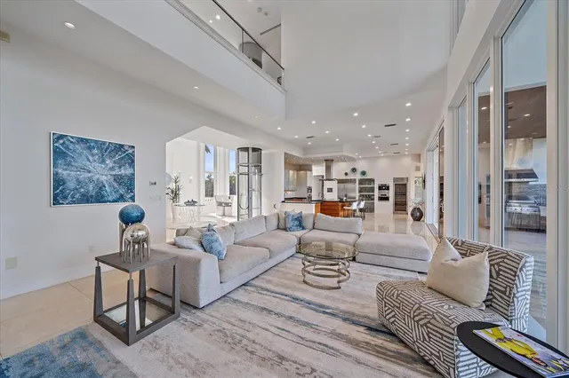 a spacious bedroom with a bed and a large window