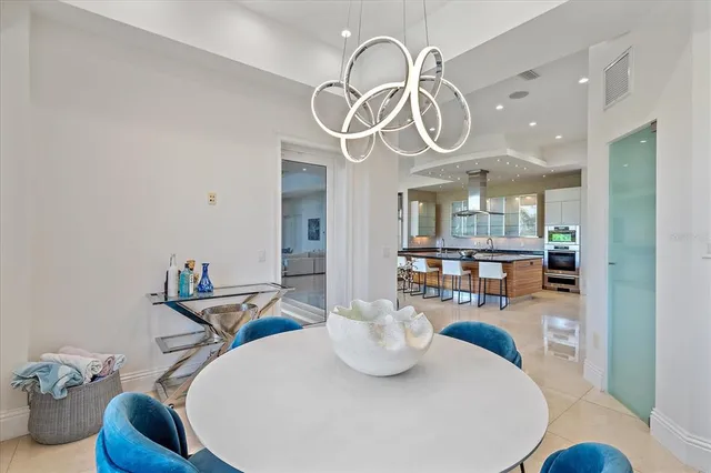 a spacious bathroom with a granite countertop sink and a mirror