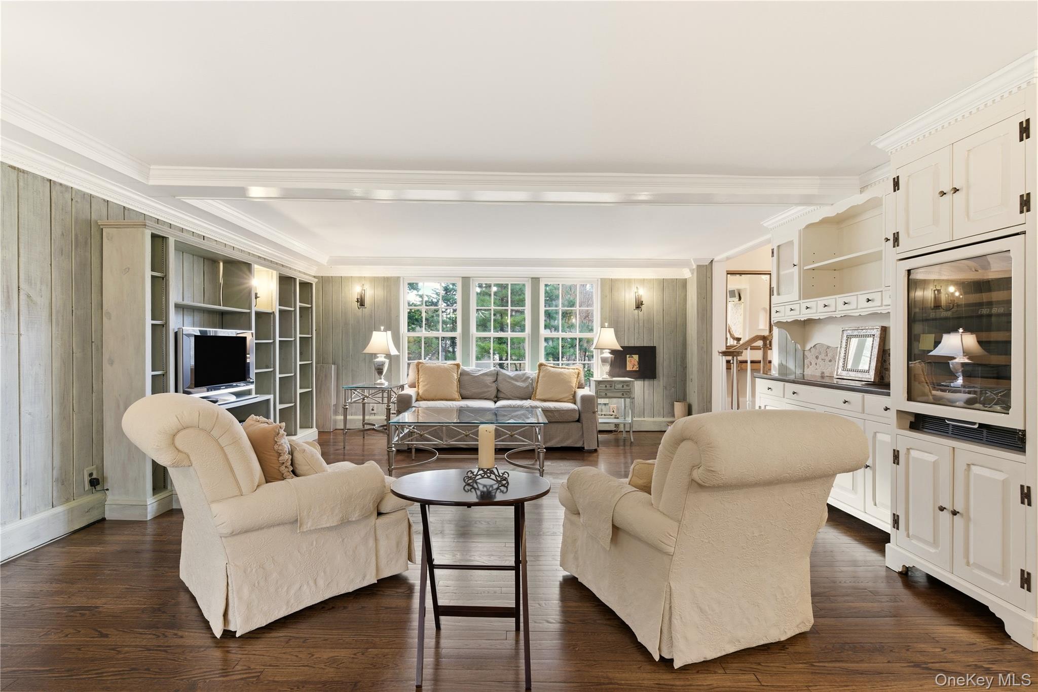 104 Fort Hill Road Huntington, NY 11743 - Photo 13 of 32 a living room with furniture and a large window