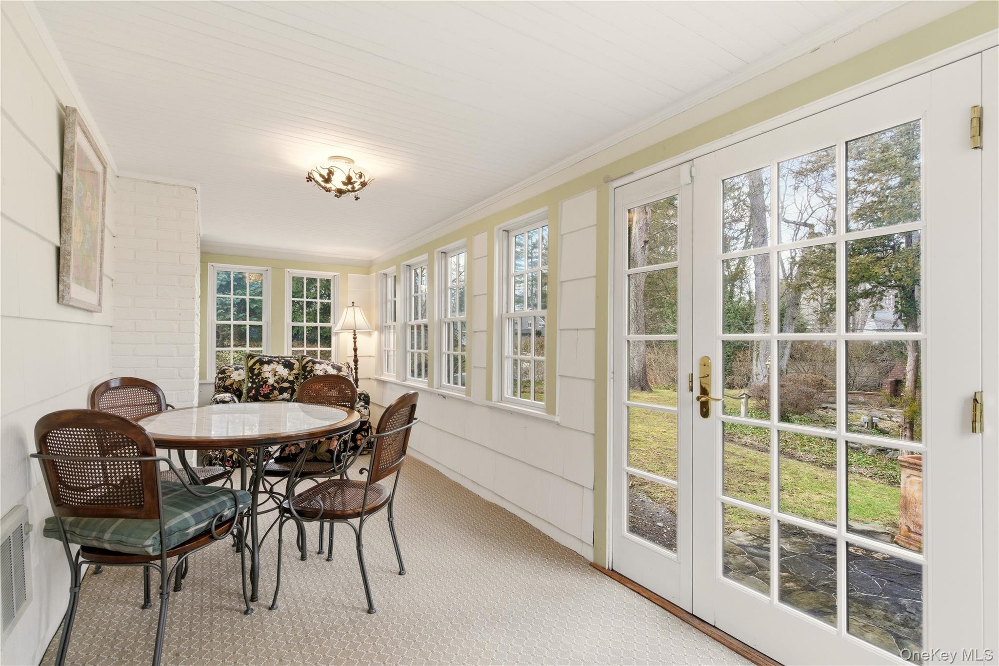 104 Fort Hill Road Huntington, NY 11743 - Photo 16 of 32 a dining room with furniture and windows