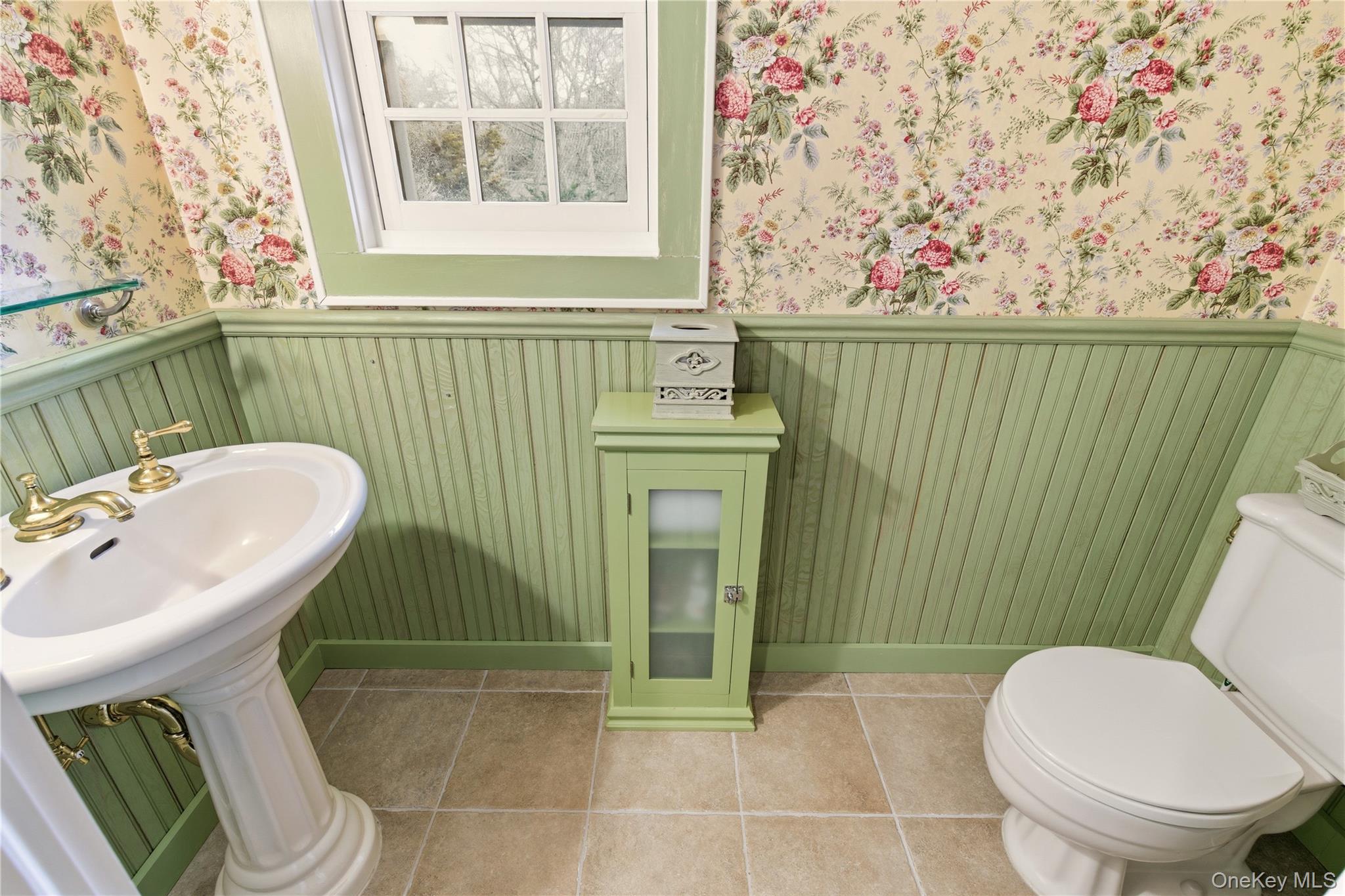104 Fort Hill Road Huntington, NY 11743 - Photo 17 of 32 a bathroom with a toilet and a sink