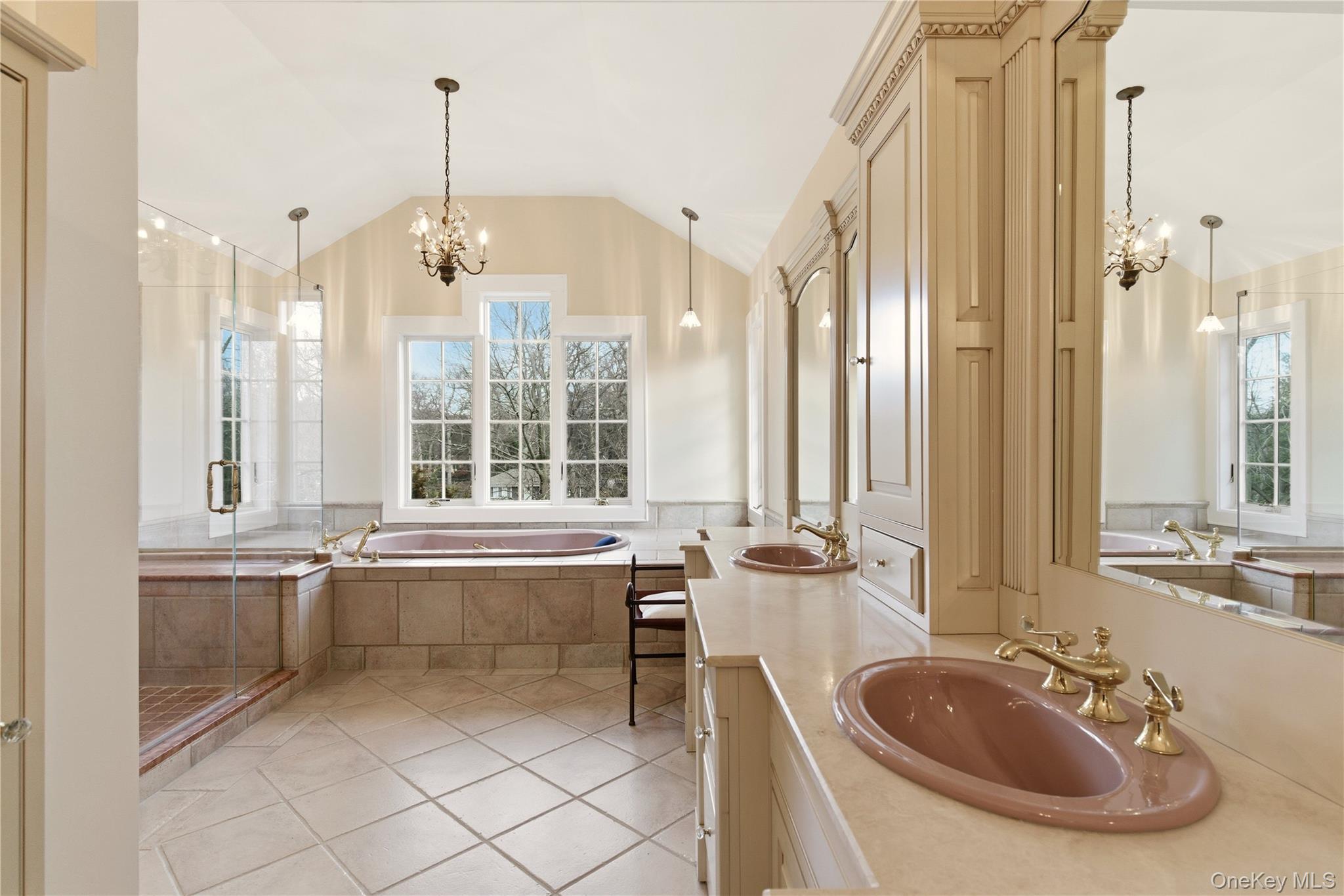 104 Fort Hill Road Huntington, NY 11743 - Photo 19 of 32 a bathroom with a tub sink and mirror