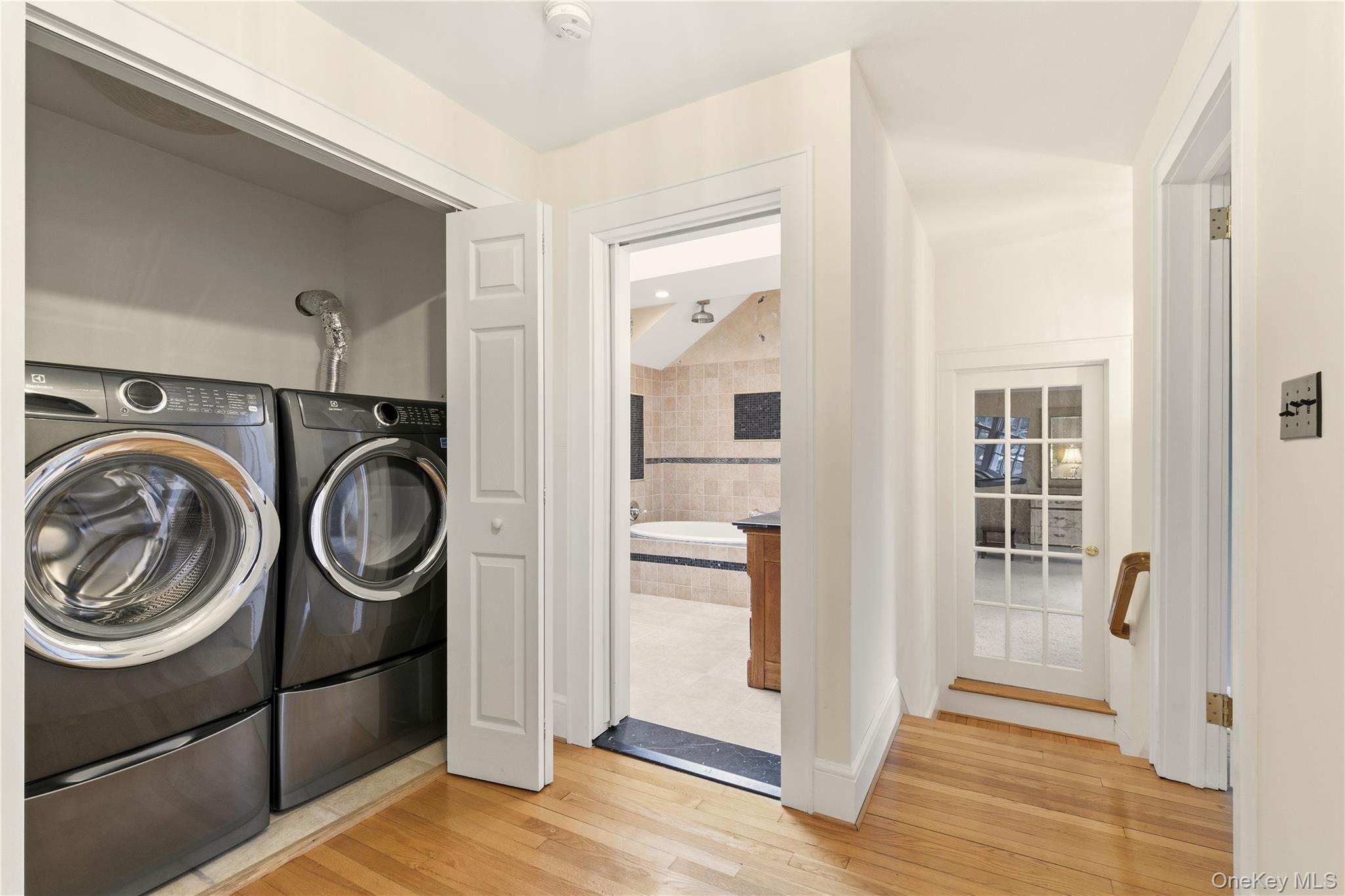 104 Fort Hill Road Huntington, NY 11743 - Photo 20 of 32 a view of storage and utility room with washer and dryer