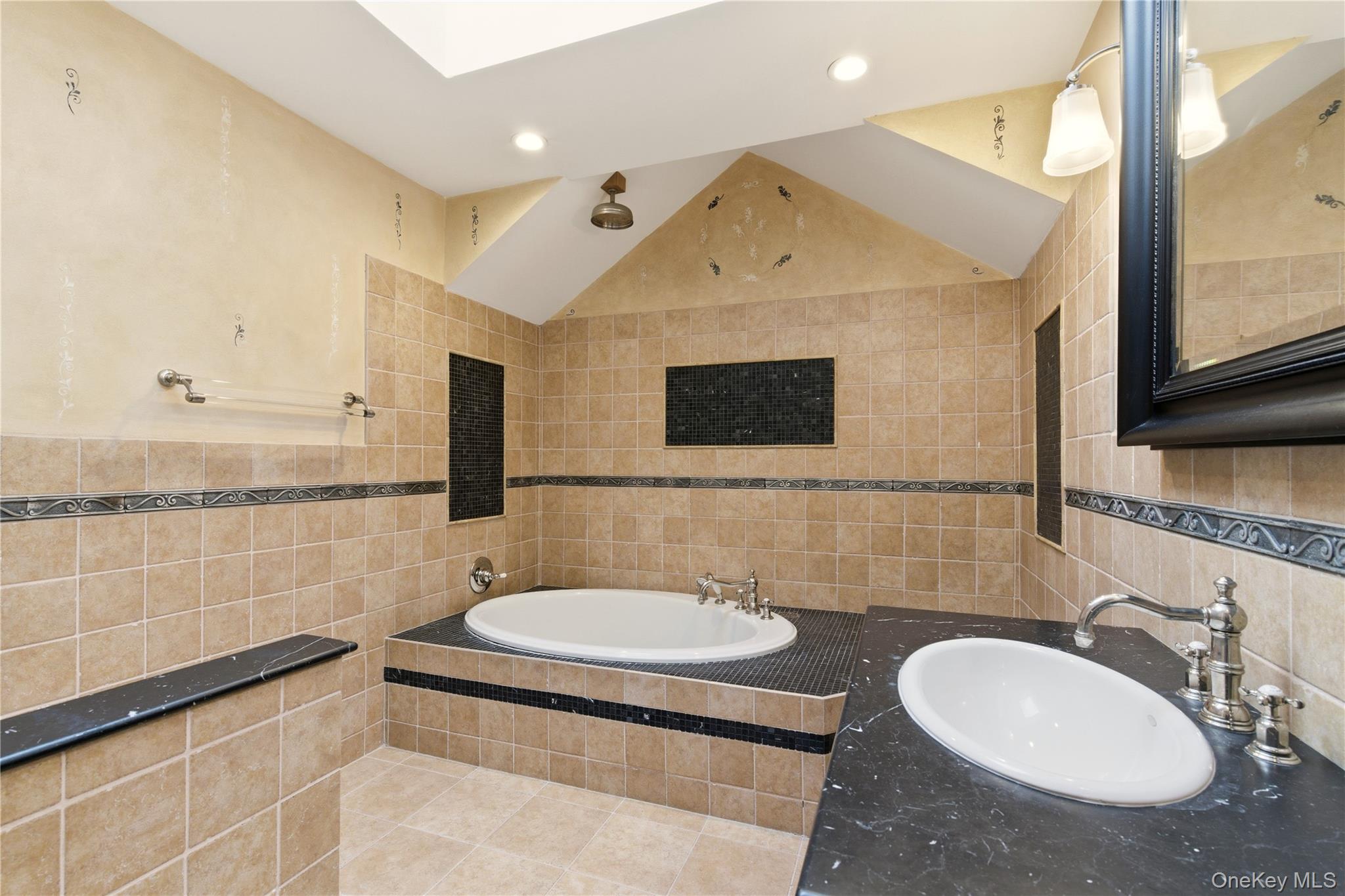 104 Fort Hill Road Huntington, NY 11743 - Photo 22 of 32 a bathroom with a sink a toilet and mirror