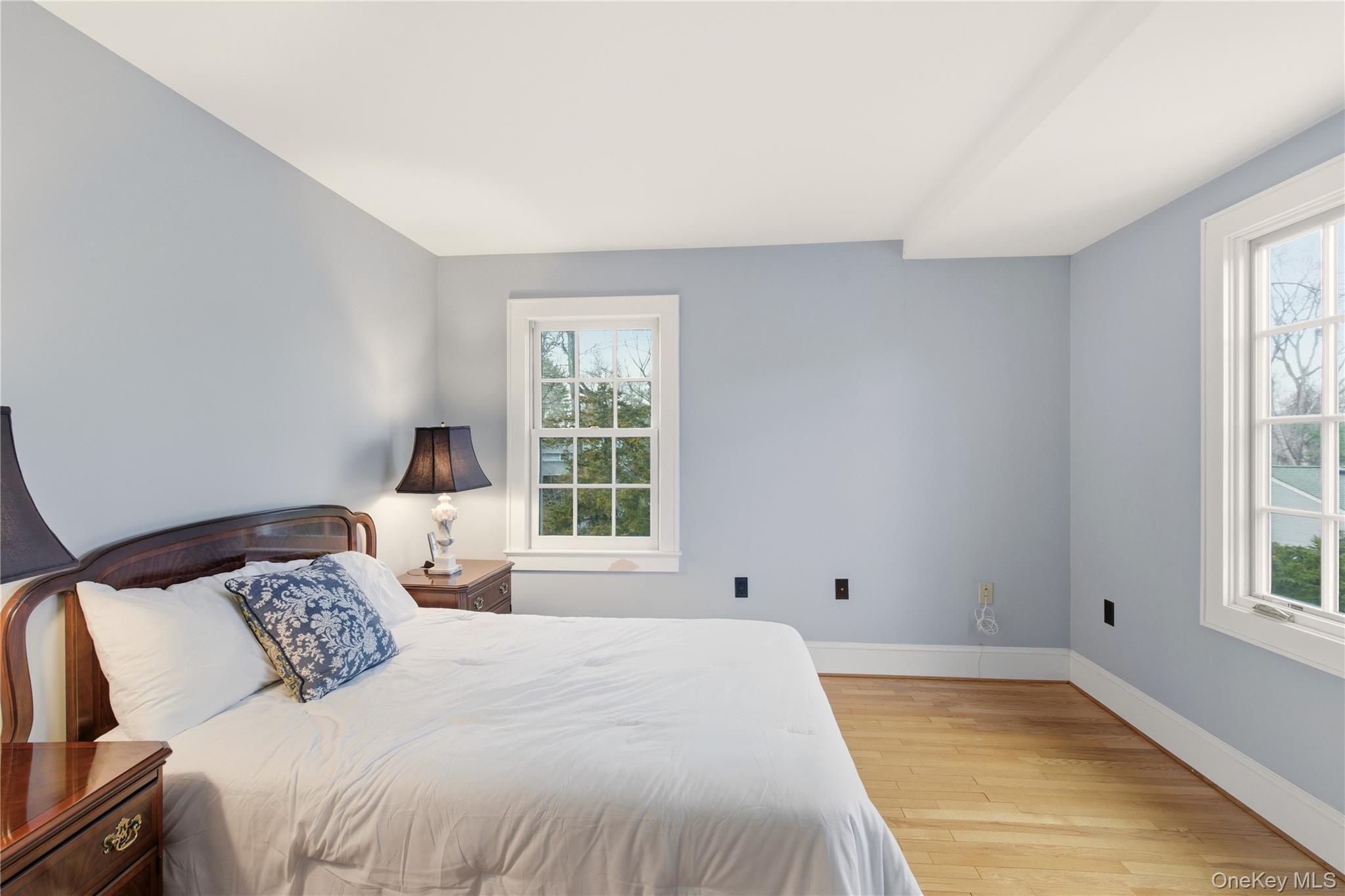 104 Fort Hill Road Huntington, NY 11743 - Photo 23 of 32 a bedroom with a bed and a window