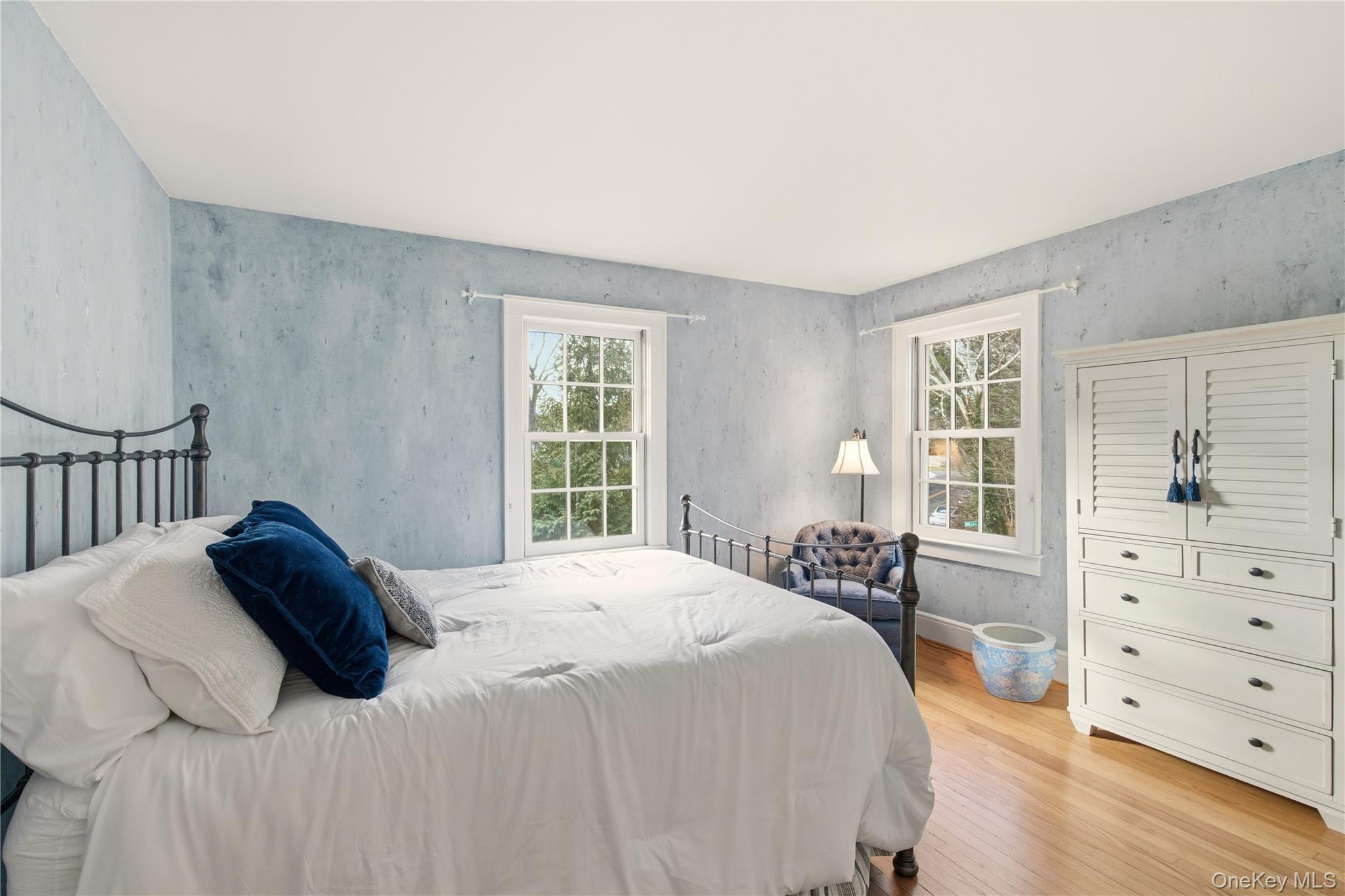 104 Fort Hill Road Huntington, NY 11743 - Photo 24 of 32 a bedroom with a bed and a dresser