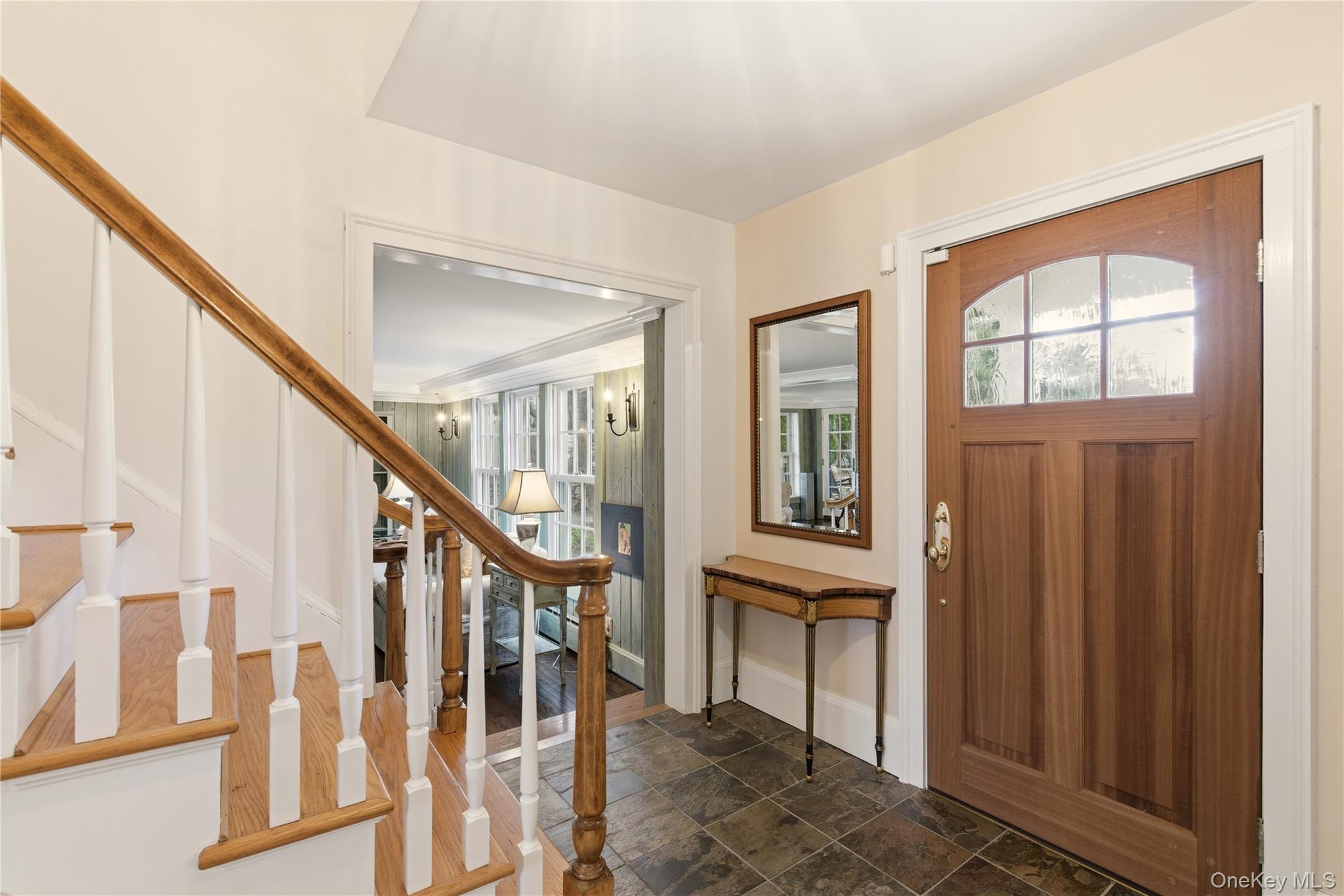 104 Fort Hill Road Huntington, NY 11743 - Photo 6 of 32 a view of an entryway with wooden floor and stairs