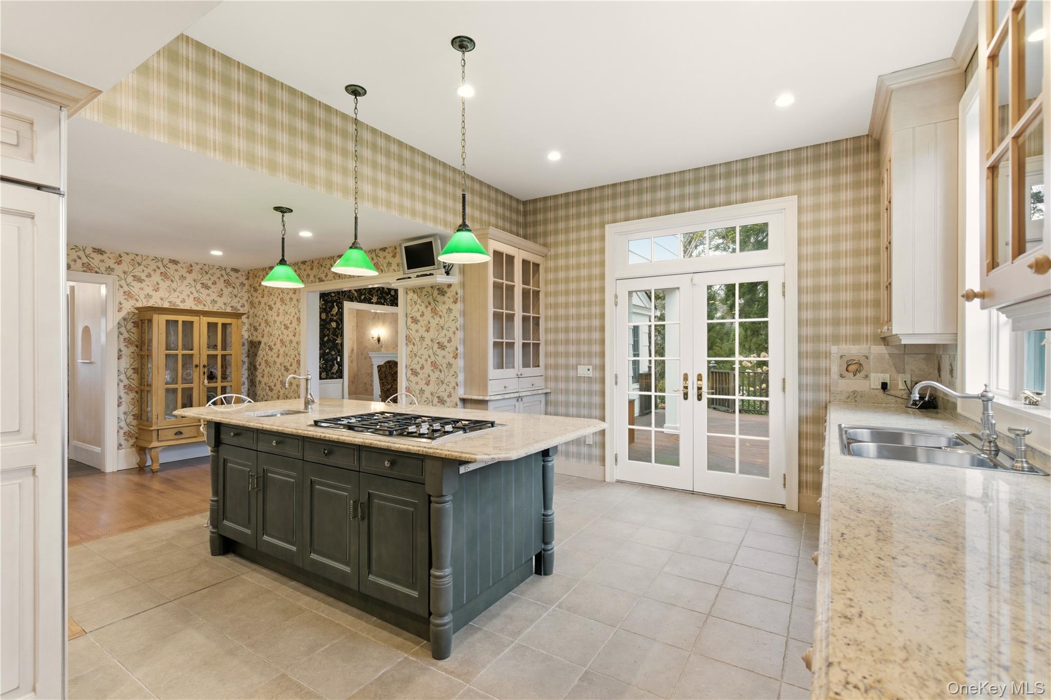 104 Fort Hill Road Huntington, NY 11743 - Photo 9 of 32 a kitchen with stainless steel appliances granite countertop a stove and a sink