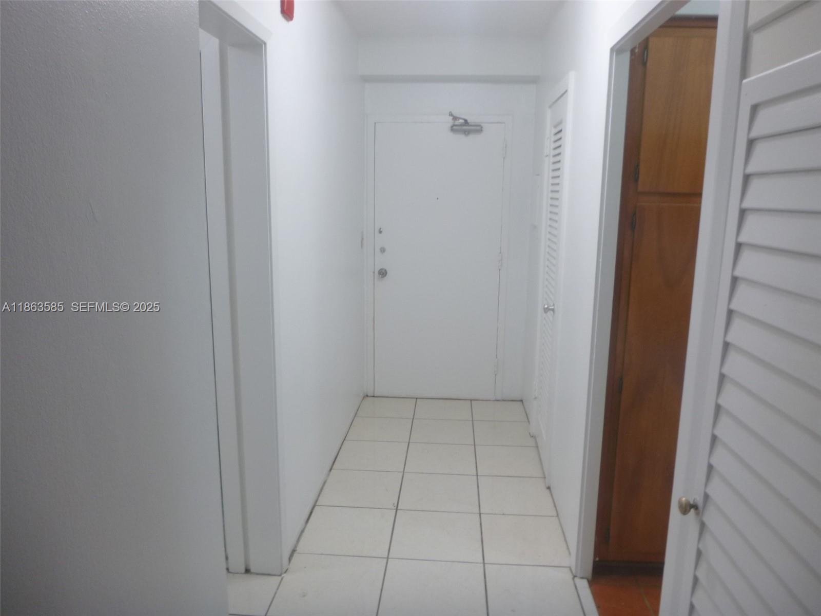 1430 Brickell Bay Drive, Unit 301 Miami, FL 33131 - Photo 13 of 18 a view of an empty room