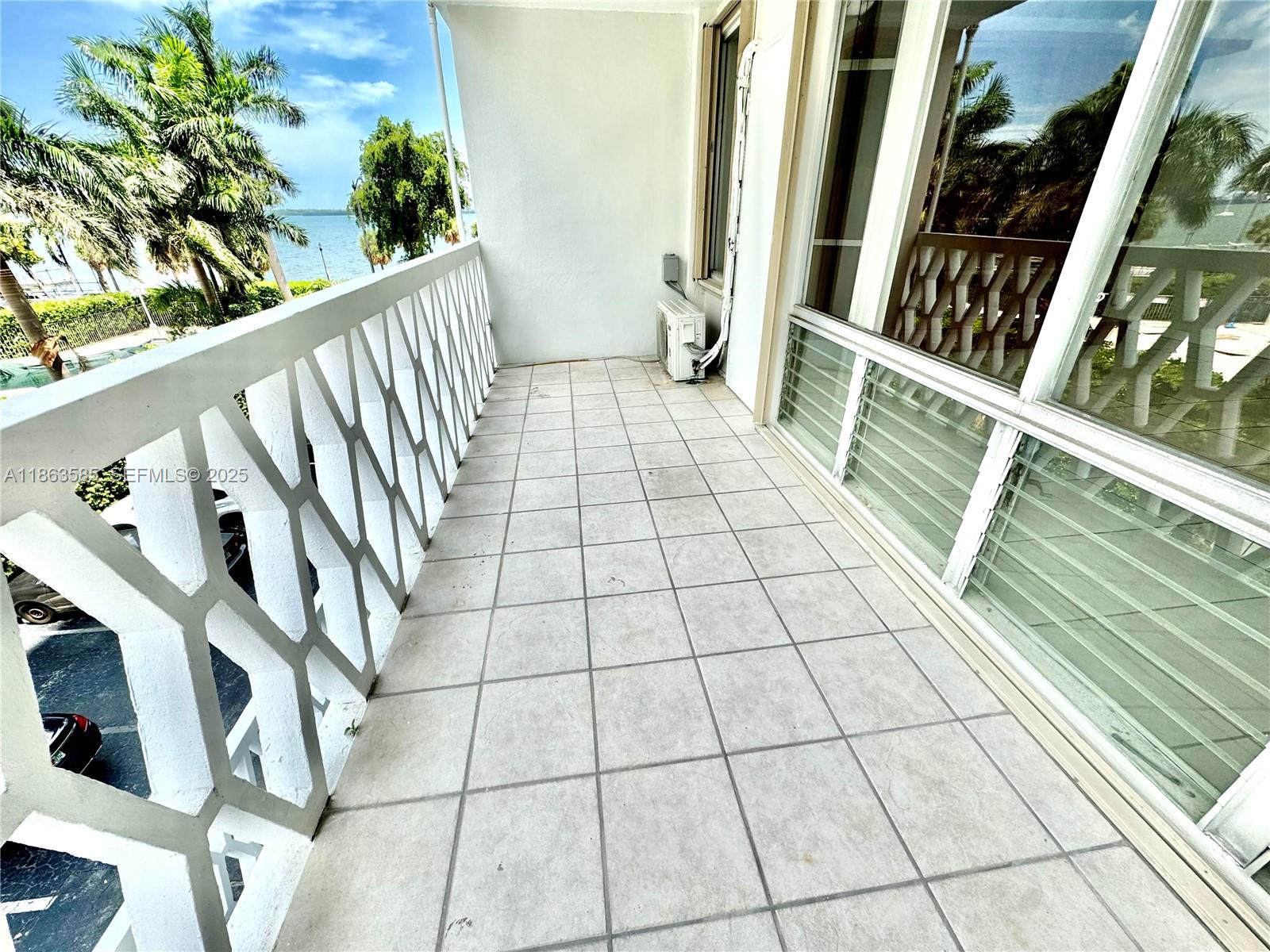 1430 Brickell Bay Drive, Unit 301 Miami, FL 33131 - Photo 4 of 18 a view of an entryway with staircase