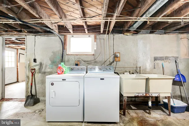 a utility room with dryer and washer