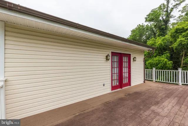 a view of a porch with a bench