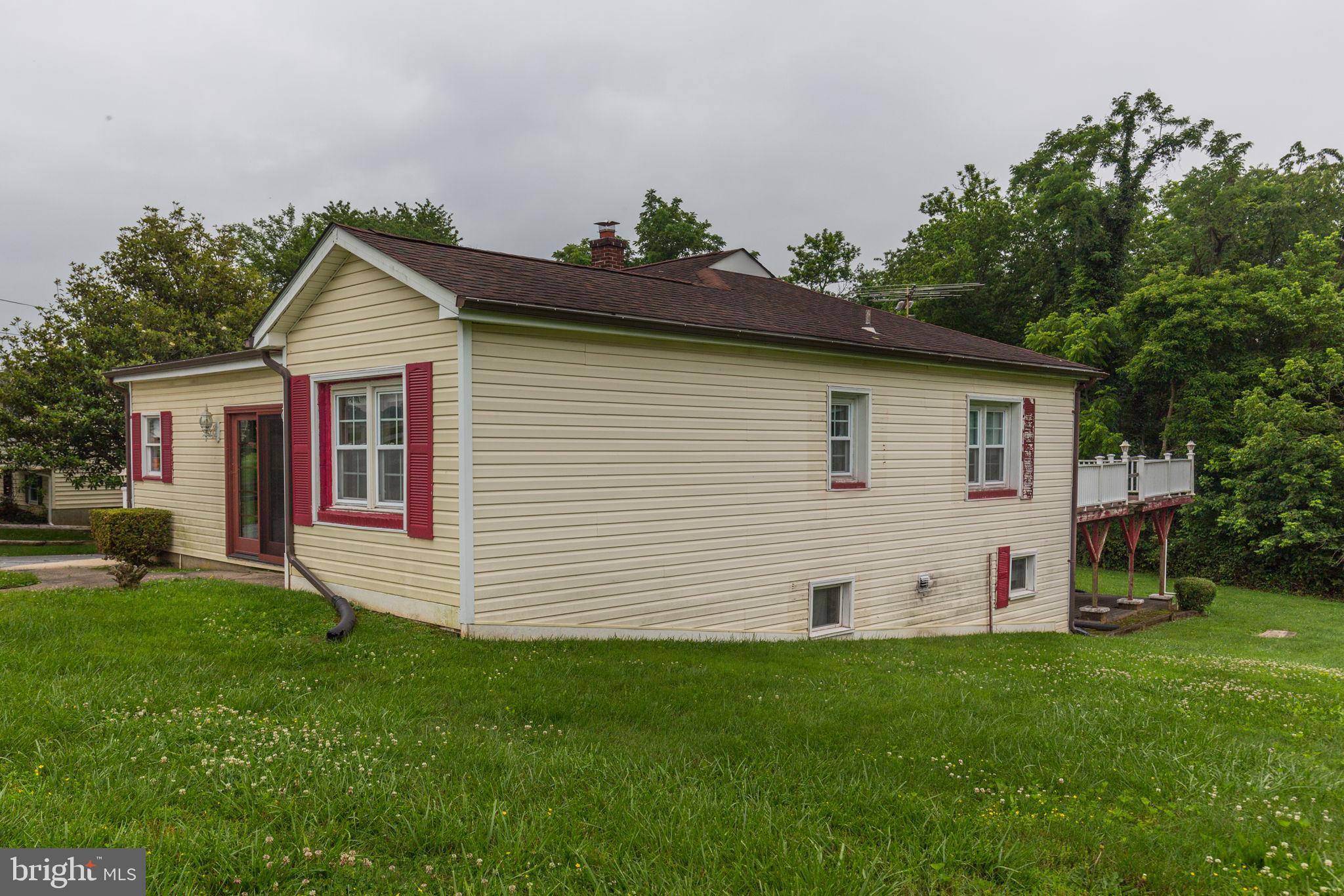 11907 Lime Plant Road New Market, MD 21774 - Photo 6 of 47 a front view of house with yard and green space
