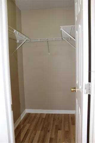 a view of outdoor space with wooden fencing