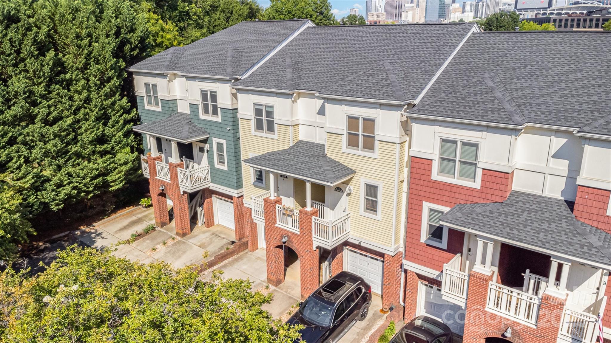 a aerial view of a house with a yard