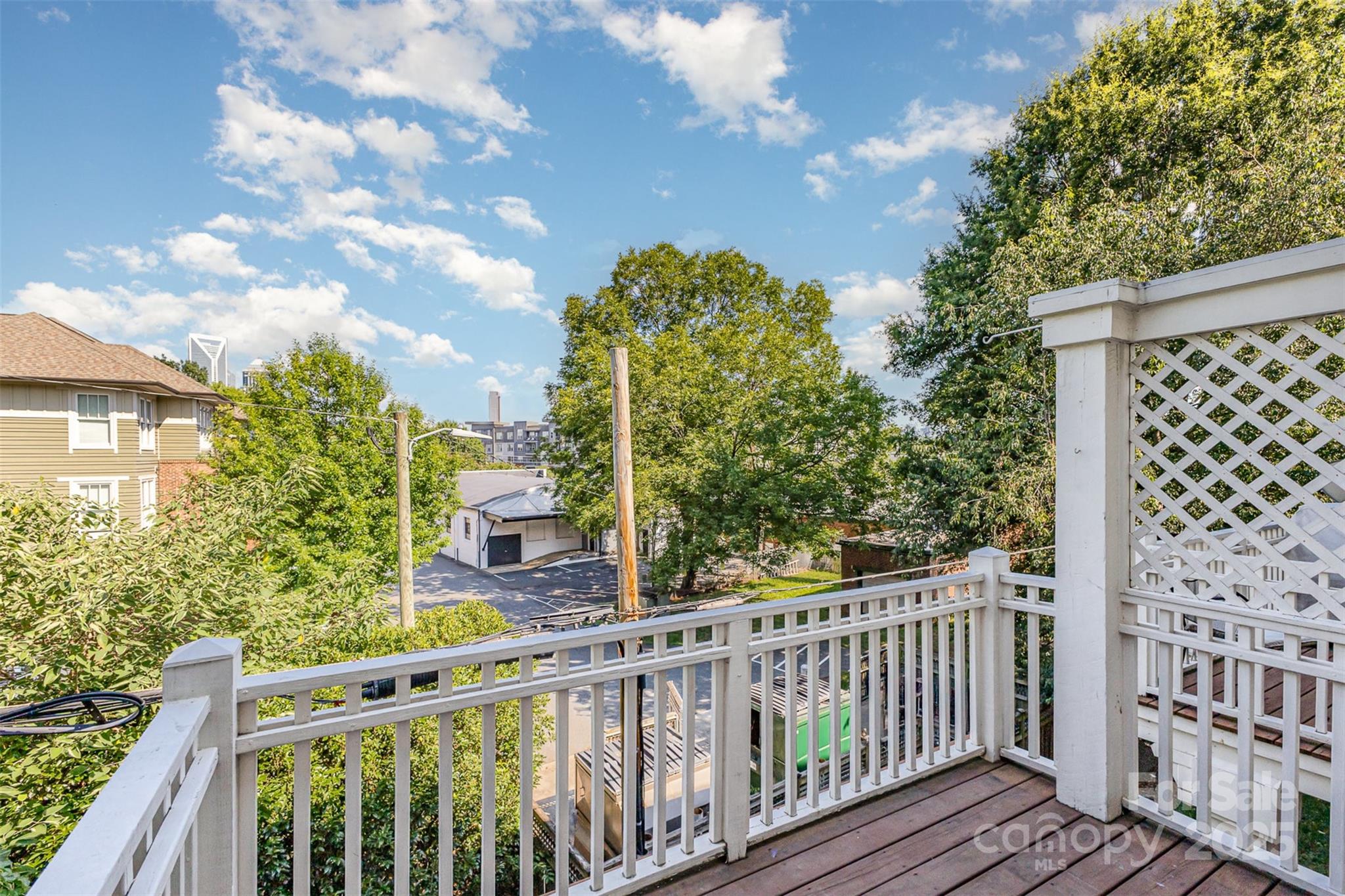 769 Grandin Road Charlotte, NC 28208 - Photo 14 of 17 a view of a chair and table in the balcony