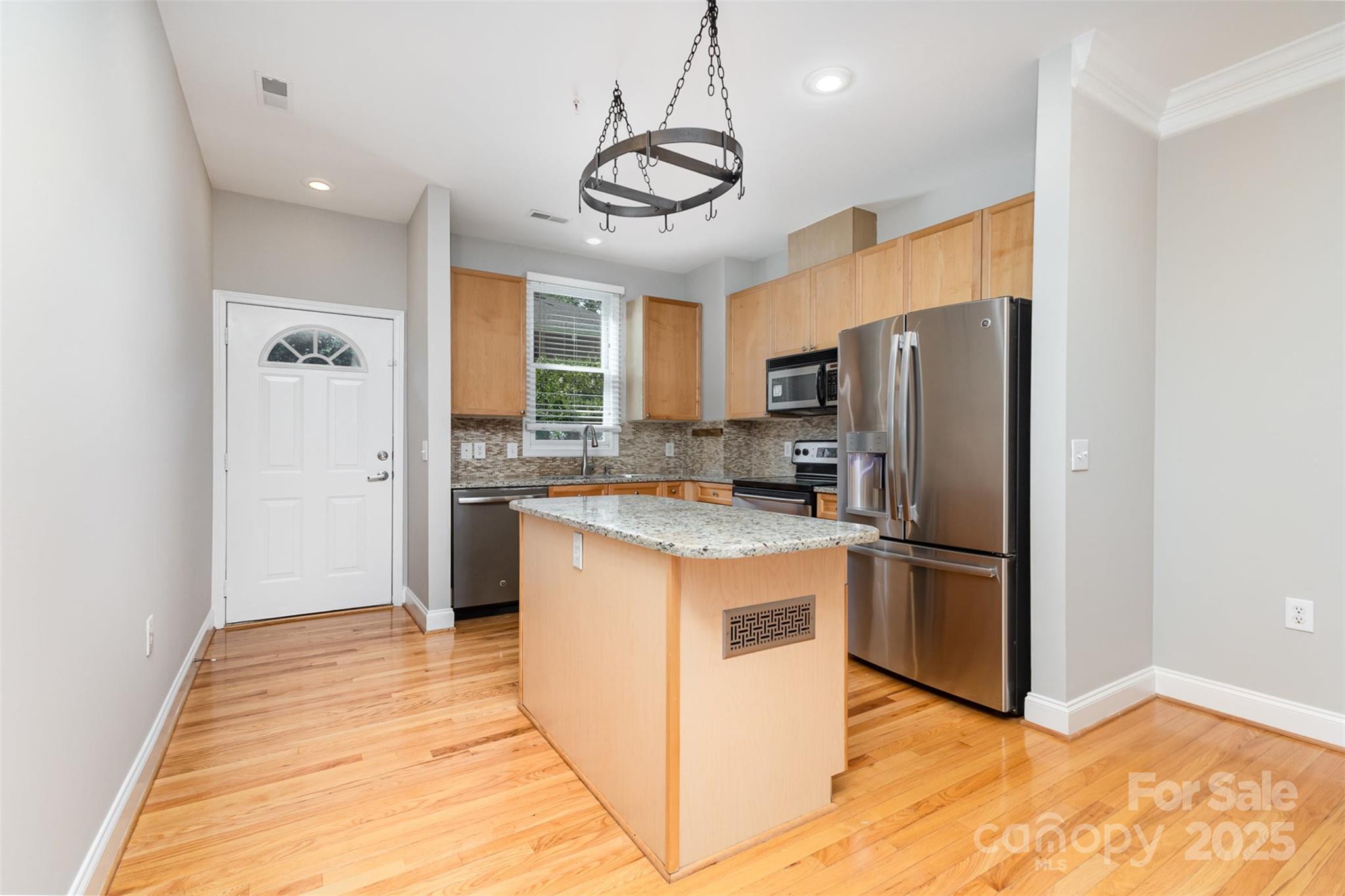 769 Grandin Road Charlotte, NC 28208 - Photo 4 of 17 a kitchen with stainless steel appliances granite countertop a refrigerator a stove a sink and a refrigerator