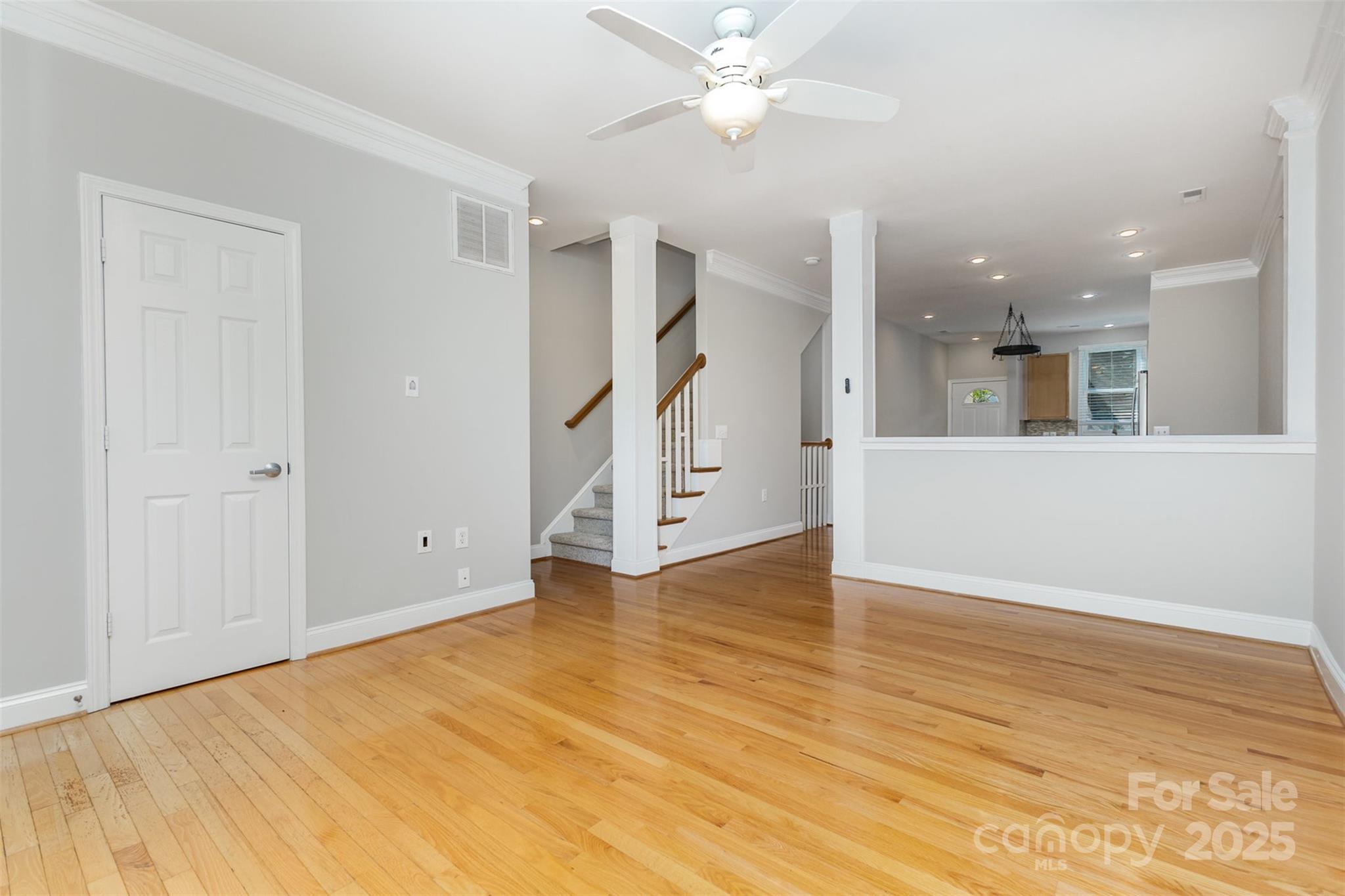 769 Grandin Road Charlotte, NC 28208 - Photo 6 of 17 wooden floor in an empty room with a window