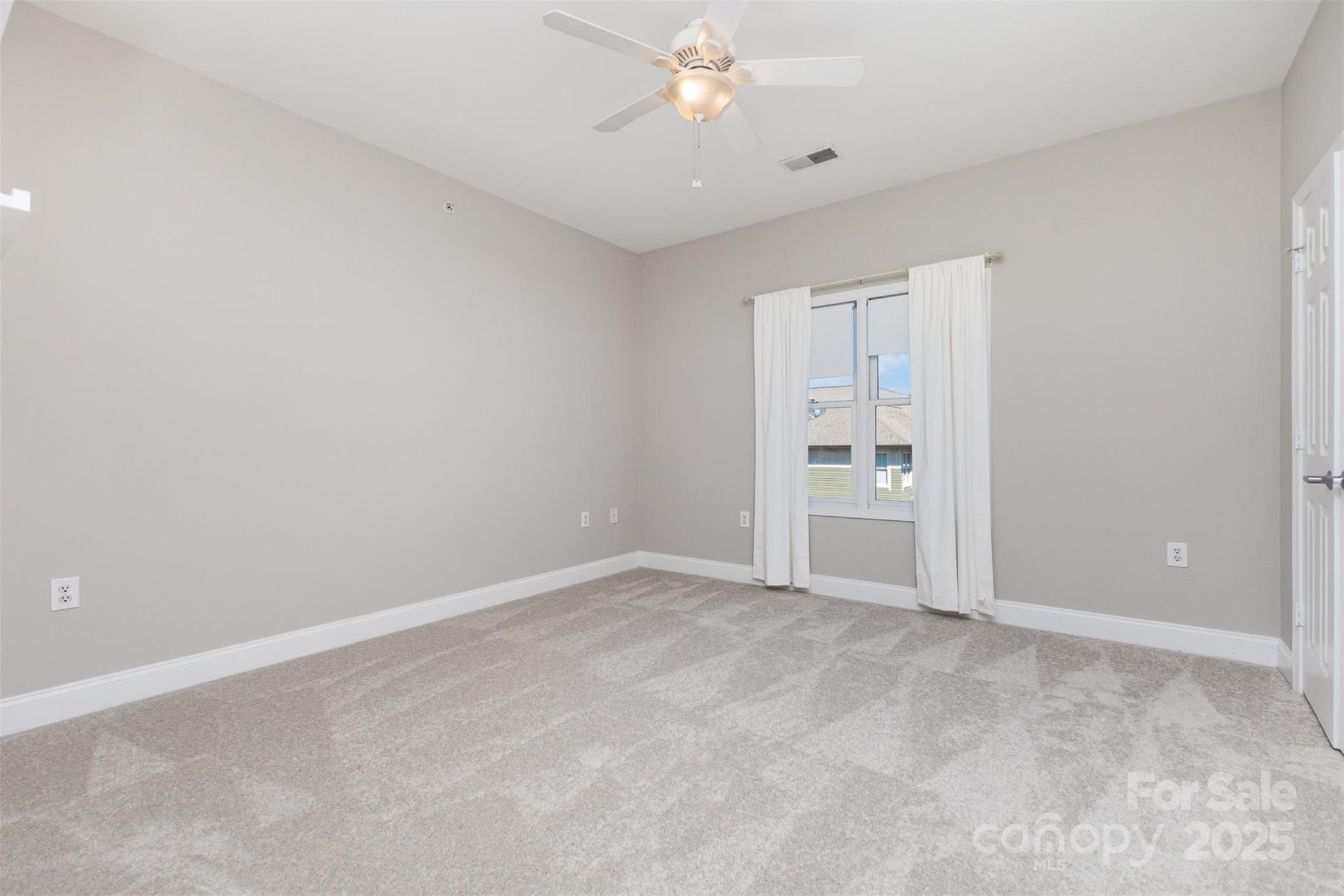 769 Grandin Road Charlotte, NC 28208 - Photo 8 of 17 a view of an empty room with a window