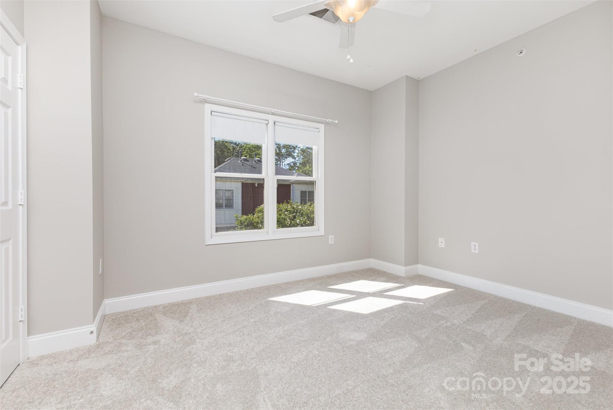769 Grandin Road Charlotte, NC 28208 - Photo 10 of 17 an empty room with windows