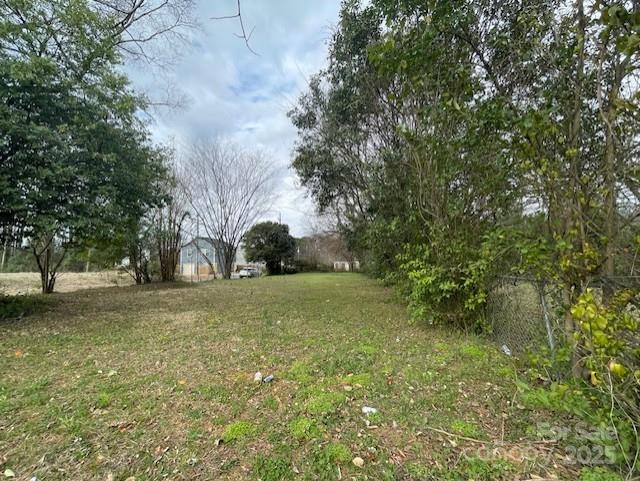 1815 Beatties Ford Road Charlotte, NC 28216 - Photo 5 of 14 a view of outdoor space and yard