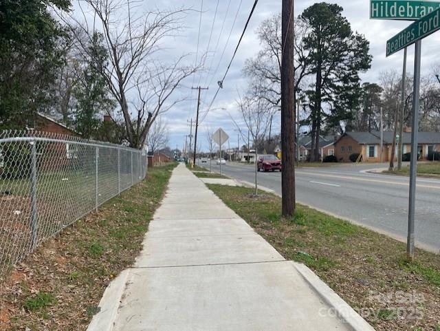 1815 Beatties Ford Road Charlotte, NC 28216 - Photo 9 of 14 a park view with large trees