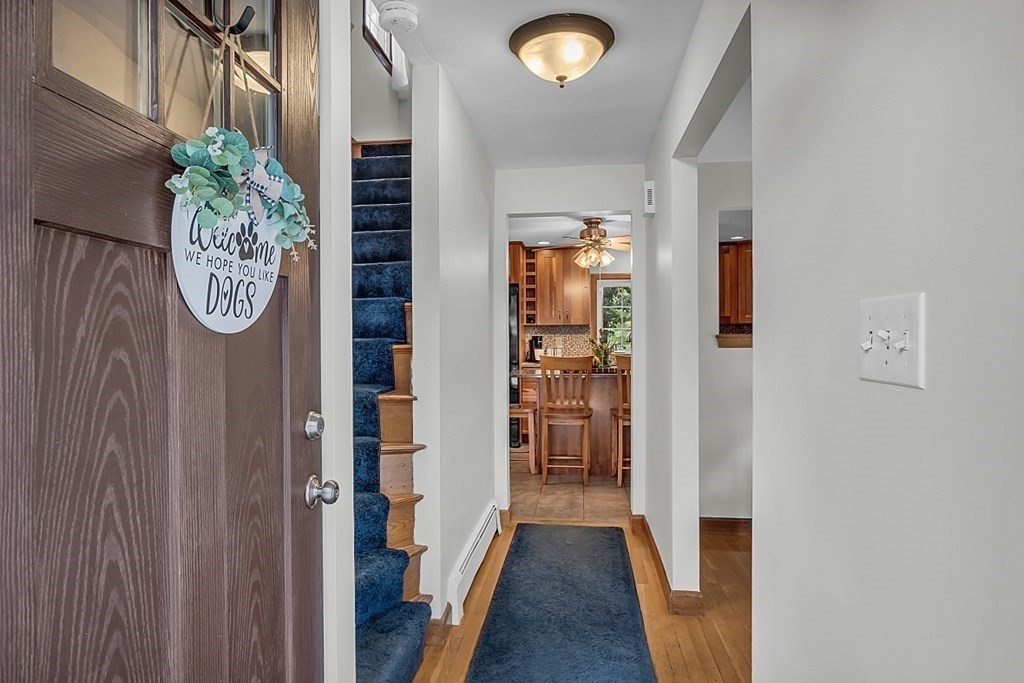 180 County Road Tewksbury, MA 01876 - Photo 16 of 40 a view of an entryway with wooden floor