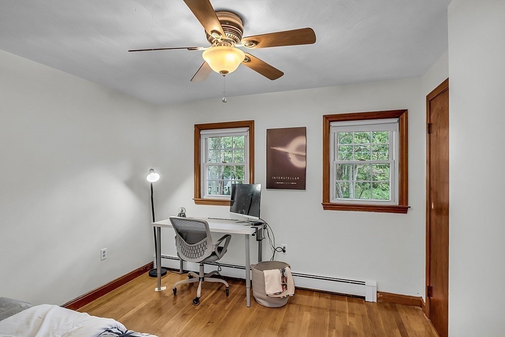 180 County Road Tewksbury, MA 01876 - Photo 24 of 40 a view of a workspace with furniture and a window