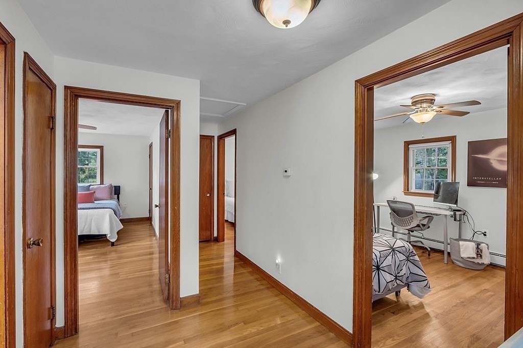 180 County Road Tewksbury, MA 01876 - Photo 27 of 40 a view of a livingroom with wooden floor and furniture