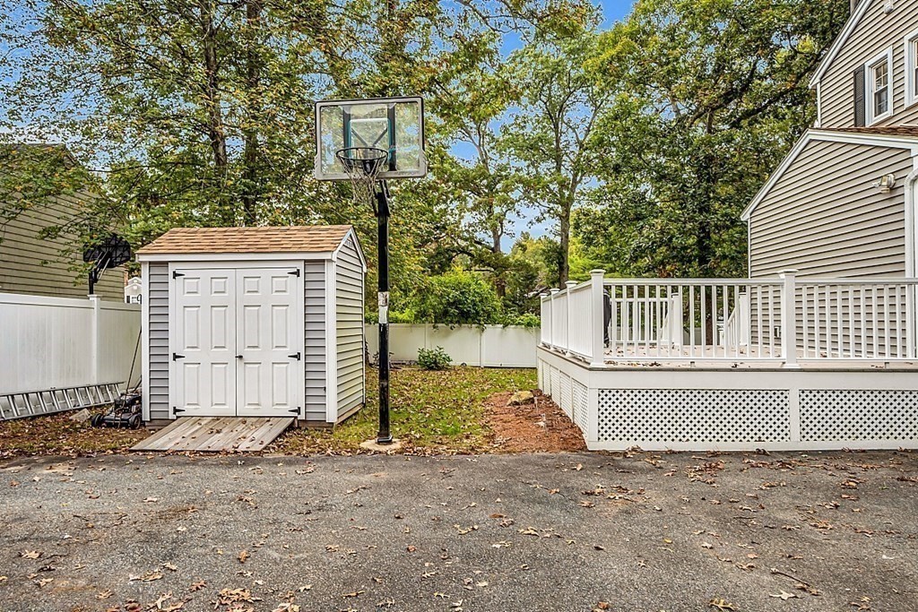 180 County Road Tewksbury, MA 01876 - Photo 33 of 40 a view of a house with backyard and garden