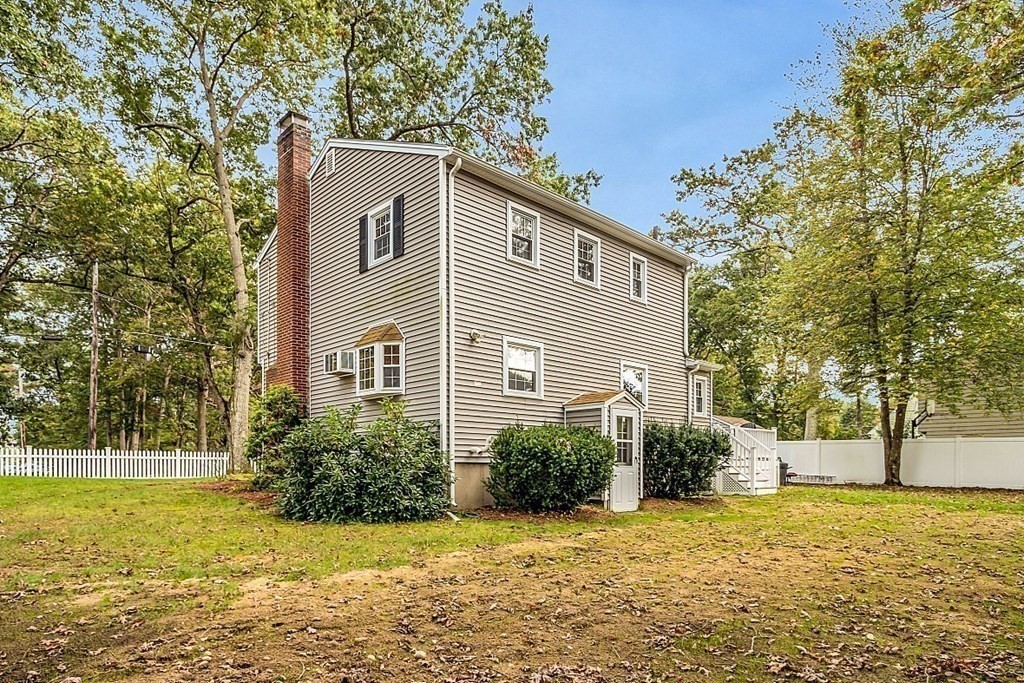 180 County Road Tewksbury, MA 01876 - Photo 34 of 40 a view of a house with a yard