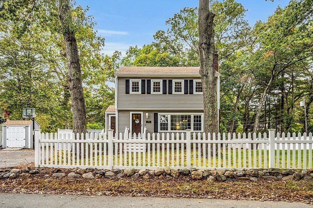 180 County Road Tewksbury, MA 01876 - Photo 39 of 40 a house that has a lots of trees in it