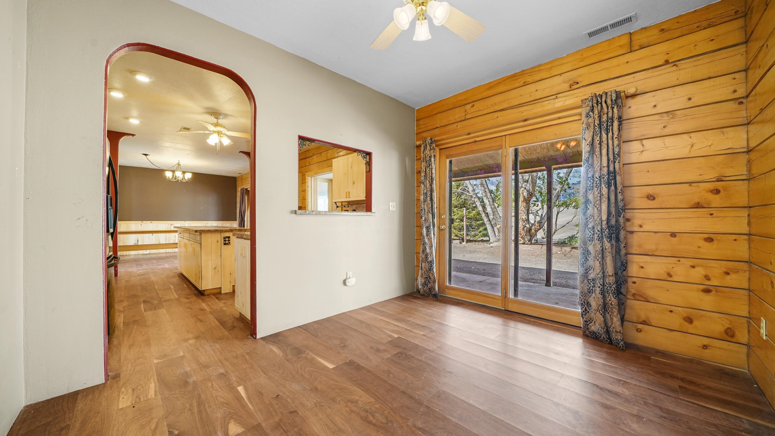 863 1400th Lane Delta, CO 81416 - Photo 15 of 42 wooden floor in an empty room with a window