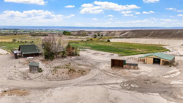 a view of a house with a street