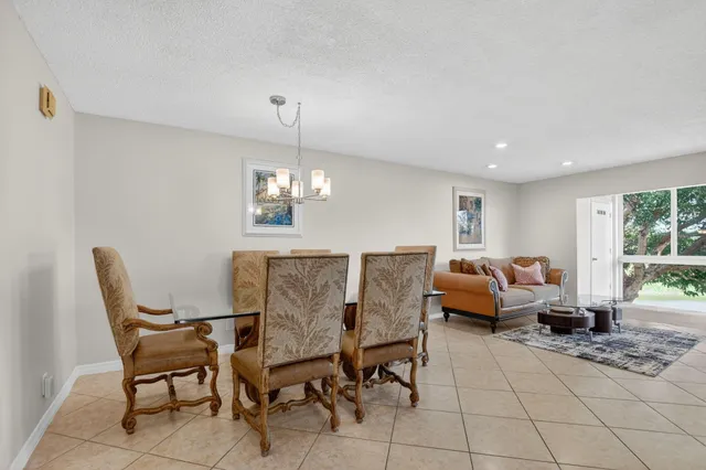 a bedroom with a bed and a lamp on table