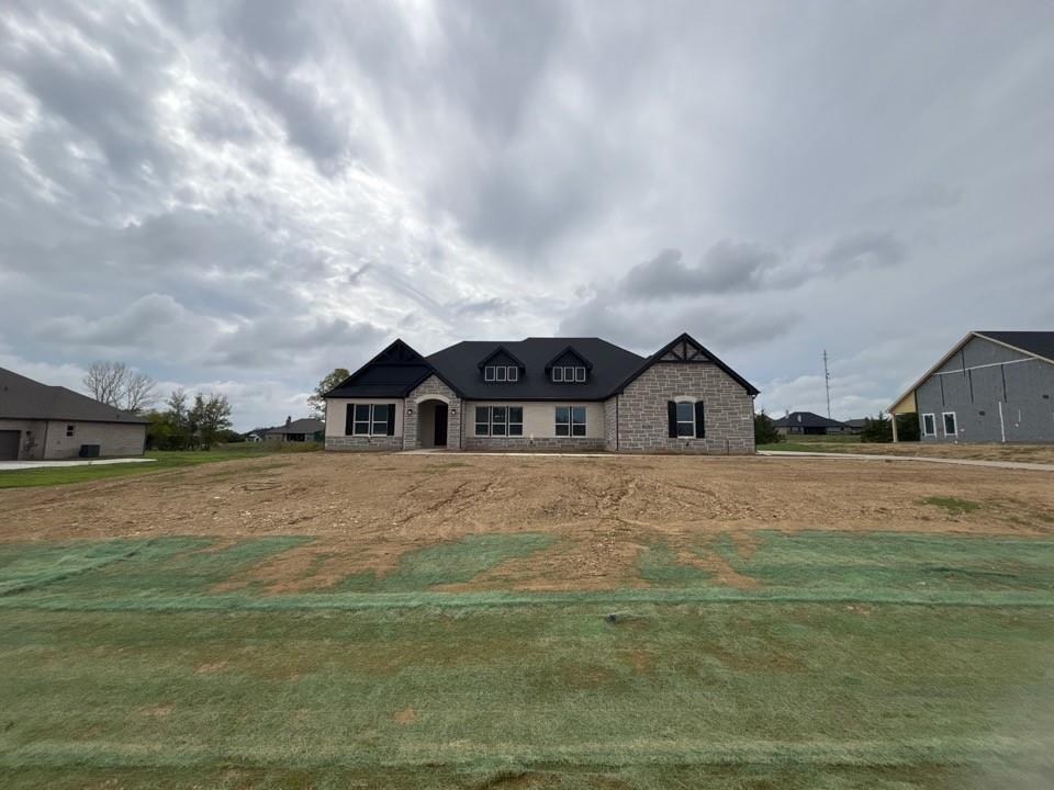 912 Creekview Whites Road Van Alstyne, TX 75495 - Photo 1 of 13 Stone and stucco exterior with dark trim accents