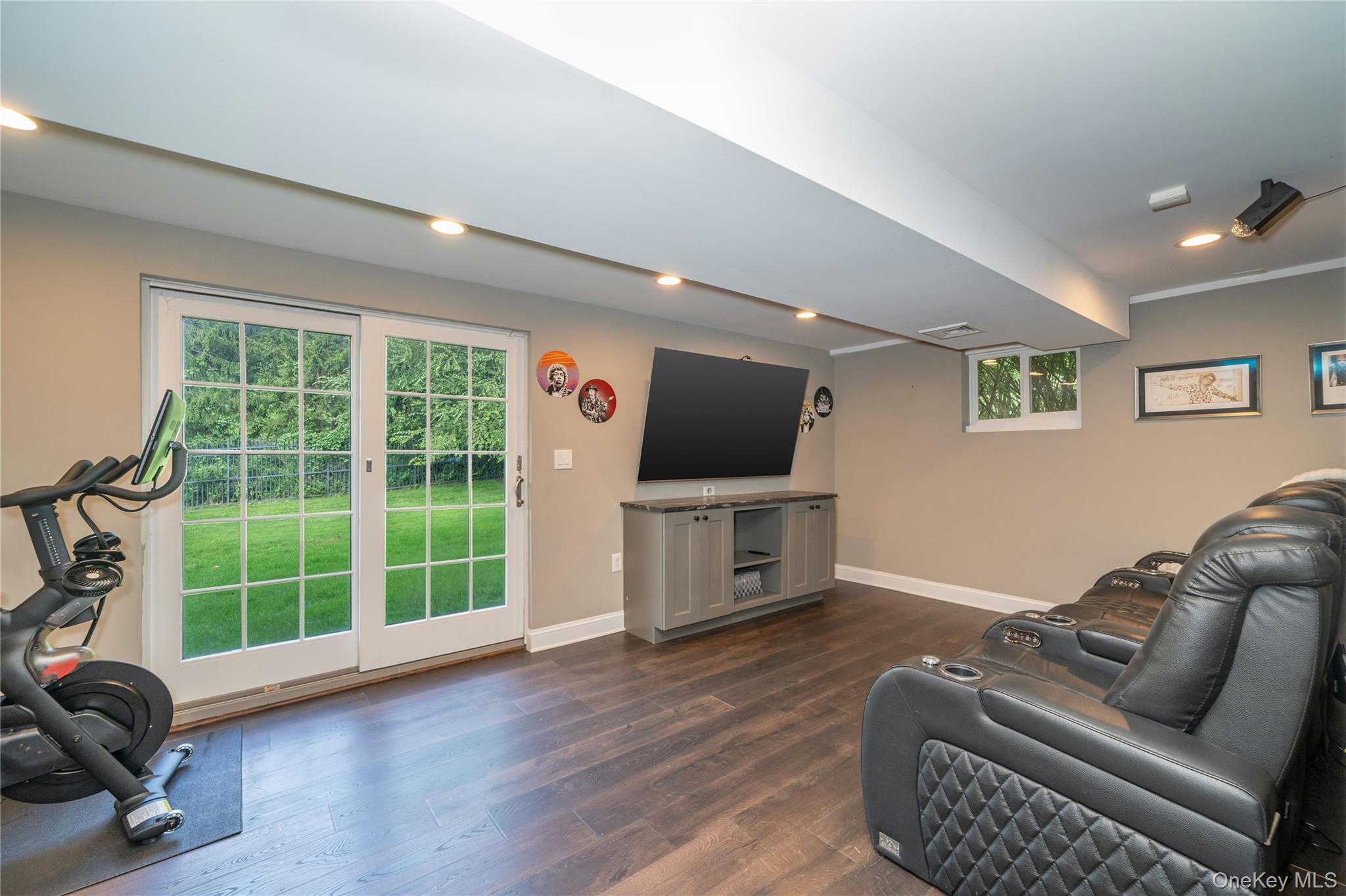 53 Tarryhill Road Tarrytown, NY 10591 - Photo 28 of 35 This versatile recreation space offers room for exercise, hobbies and more, with glass doors bring in natural light and providing direct walk-out access to the patio and hot tub.
