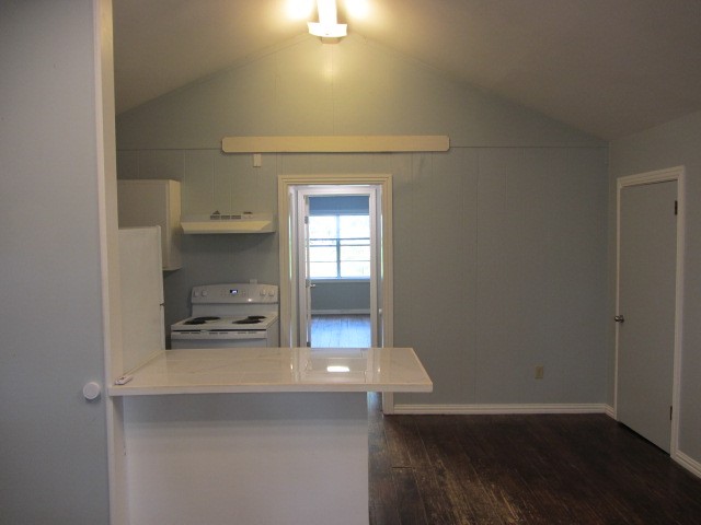 1368 Fish Hatchery Road Huntsville, TX 77320 - Photo 27 of 33 living area looking toward kitchen and bedroom