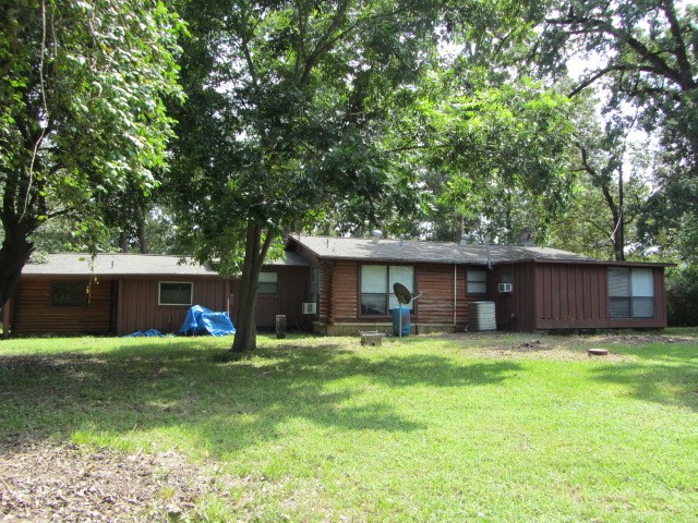 1368 Fish Hatchery Road Huntsville, TX 77320 - Photo 5 of 33 back view