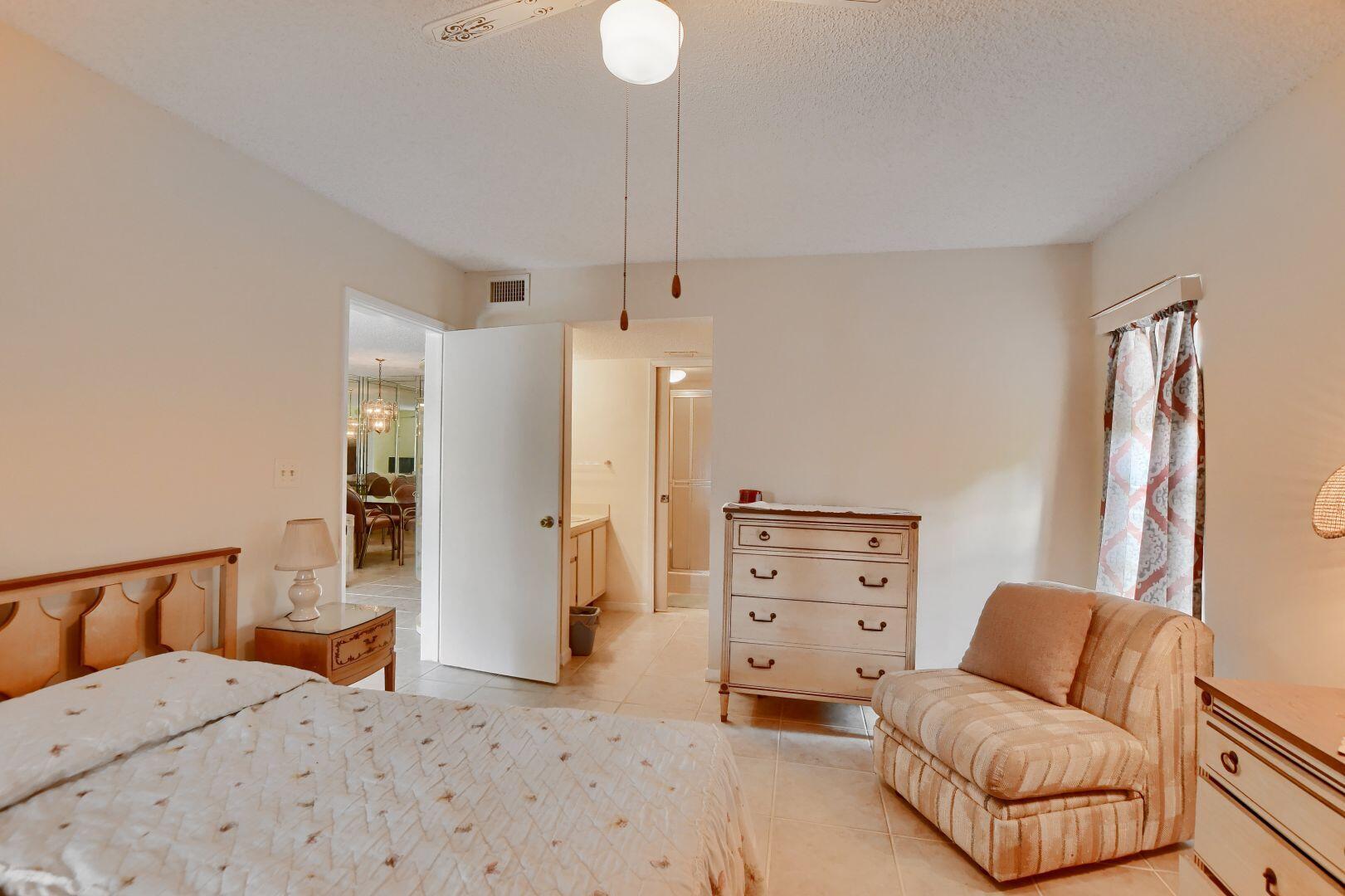 9244 Flynn Circle, Unit 4 Boca Raton, FL 33496 - Photo 17 of 41 Master Bedroom