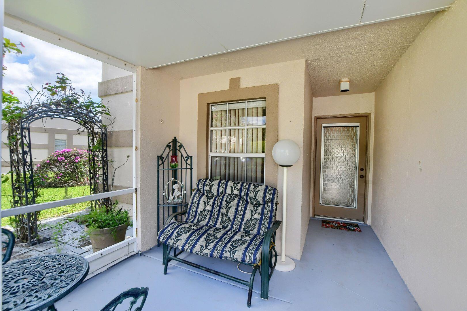 9244 Flynn Circle, Unit 4 Boca Raton, FL 33496 - Photo 4 of 41 Front Patio