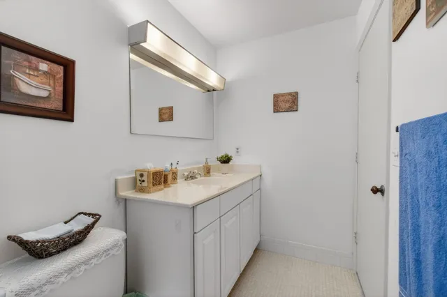 a utility room with a sink dryer and washer