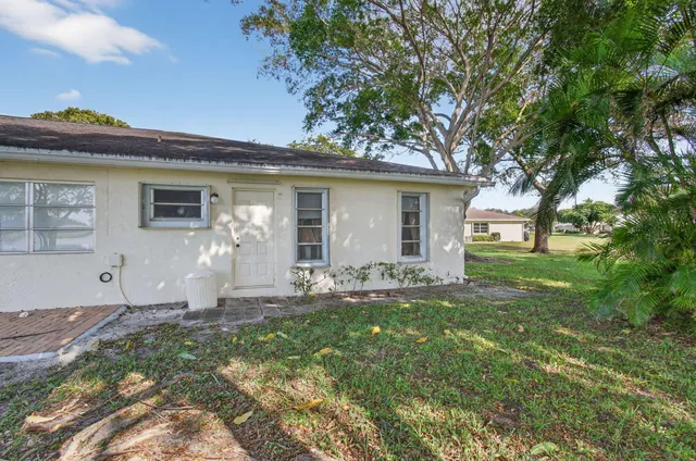 a front view of house with yard
