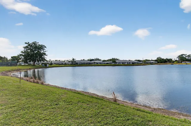 a view of a lake with a big yard