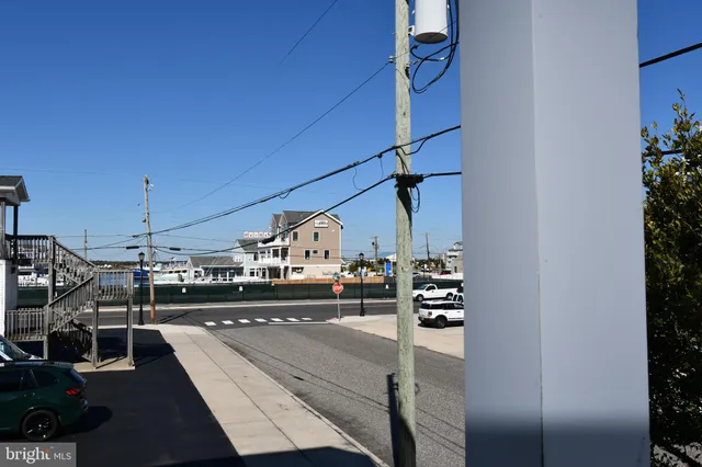 a view of a kitchen with a sink