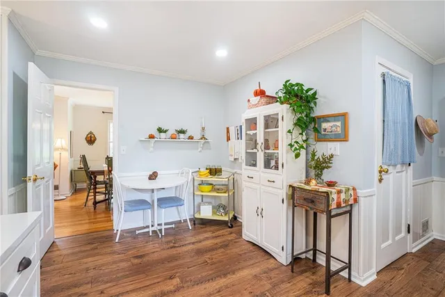 a workspace with furniture and wooden floor