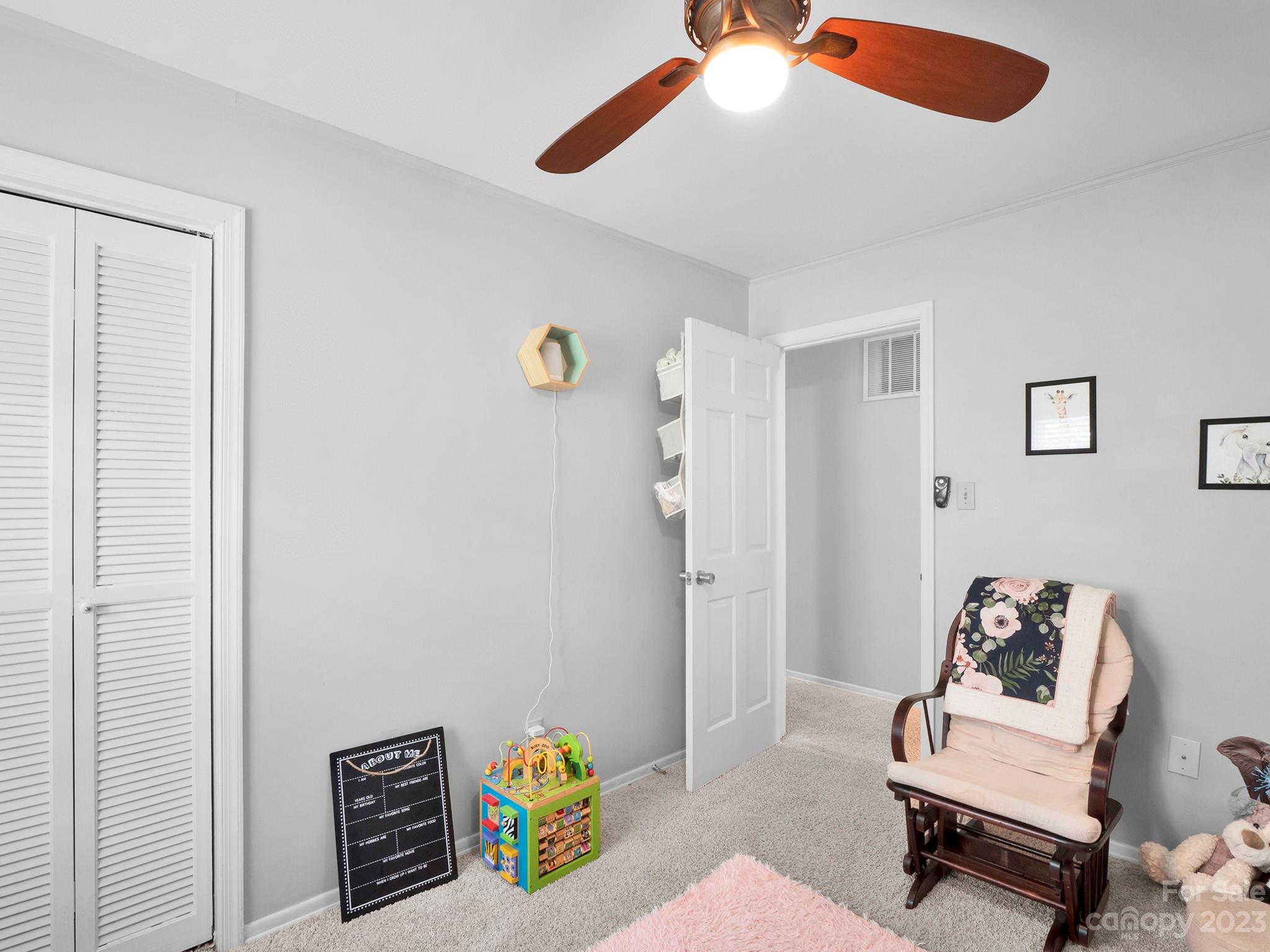 8072 Knights Bridge Road Charlotte, NC 28210 - Photo 15 of 23 a bedroom with furniture and a ceiling fan