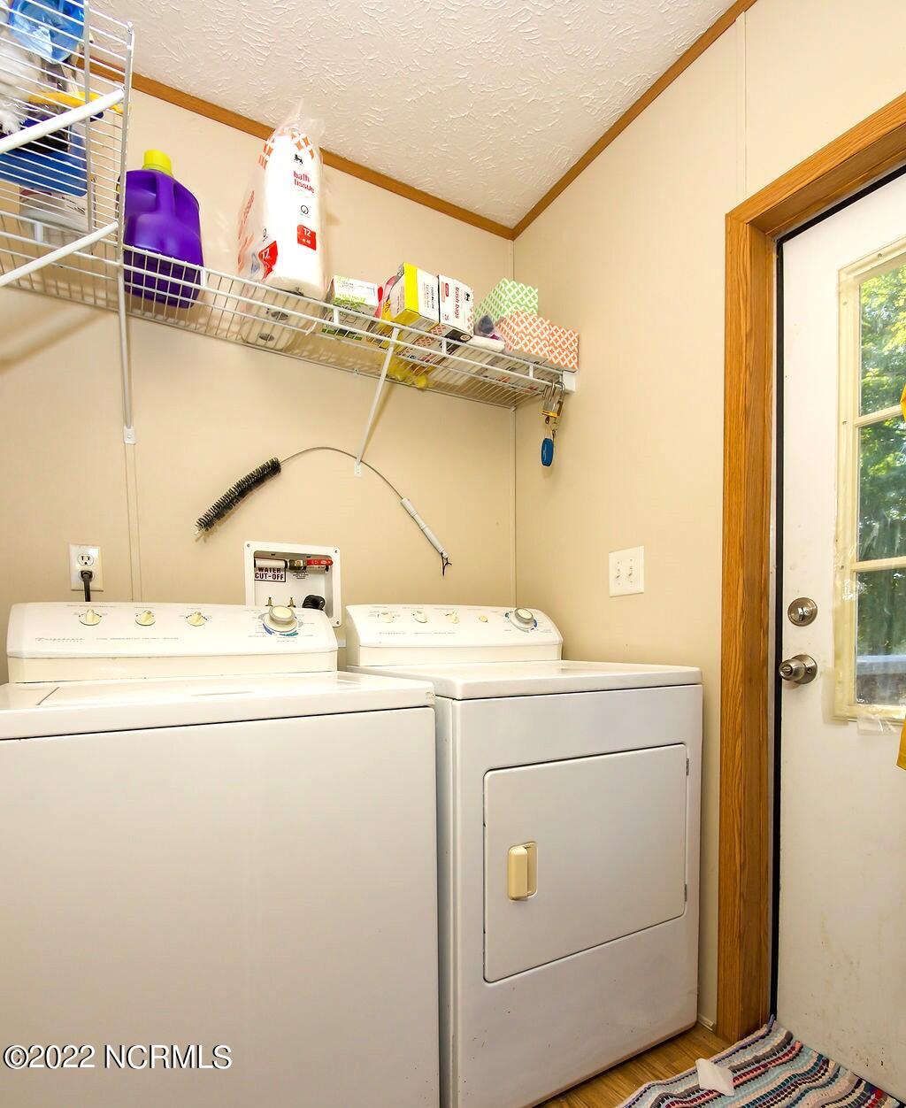 600 Old Folkstone Road Holly Ridge, NC 28445 - Photo 8 of 19 600 Old Folkstone 9 Laundry Room