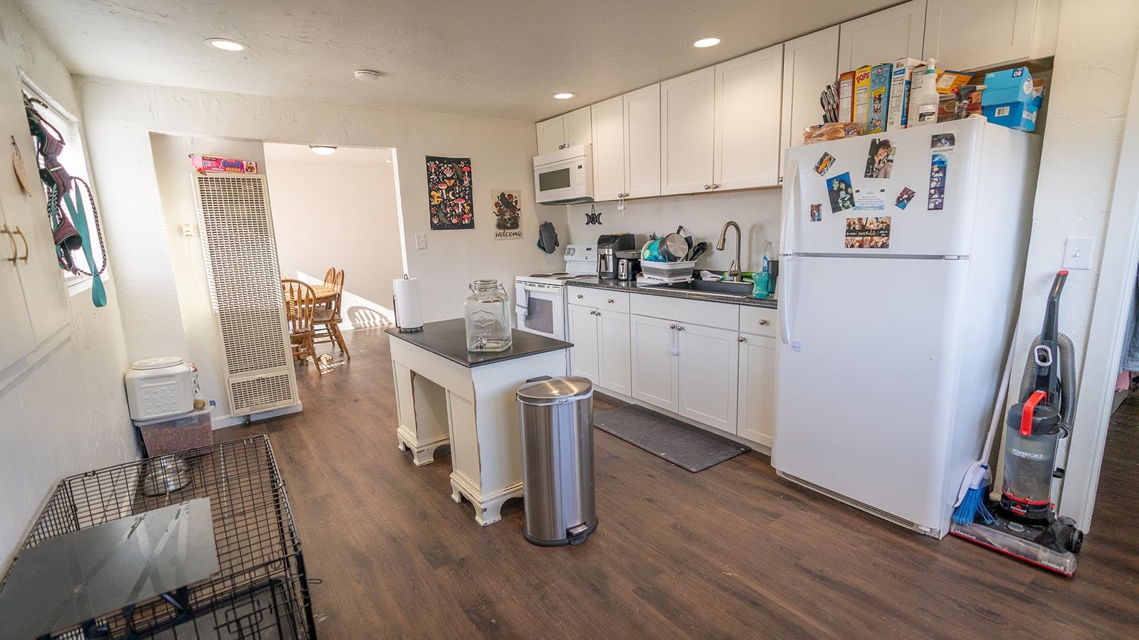 441 South Camp Road Grand Junction, CO 81507 - Photo 19 of 36 a kitchen with a refrigerator and wooden floor