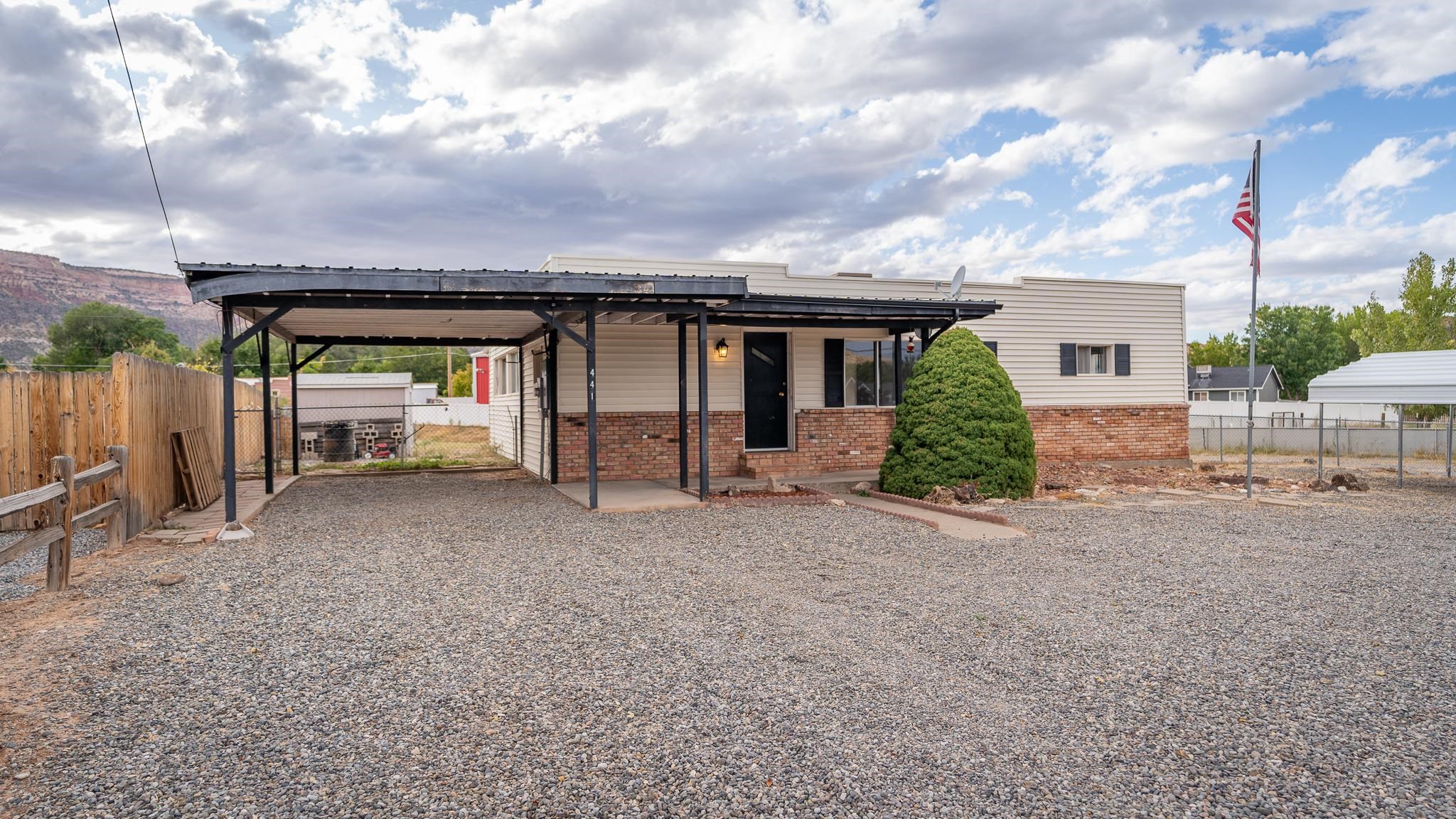 441 South Camp Road Grand Junction, CO 81507 - Photo 2 of 36 front view of a house with a street